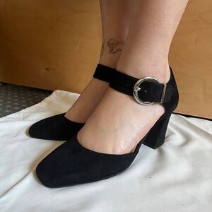 Black suede block heel shoes with buckle detail